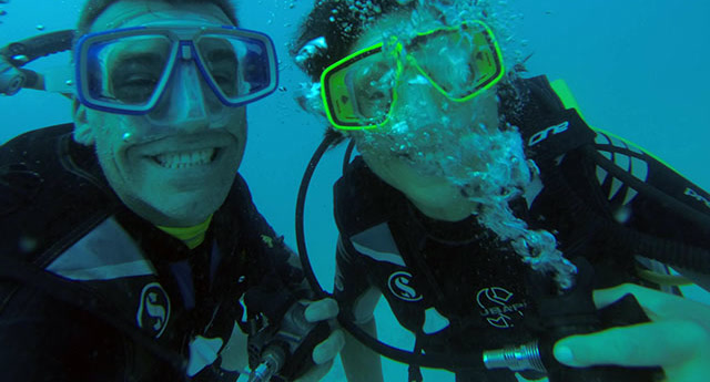 Two smiling divers on their discover scuba dive